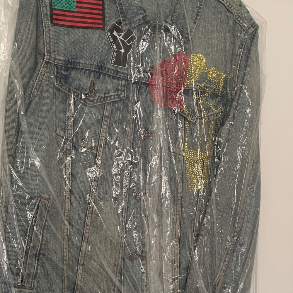 Light Blue Denim Jacket with Red & Yellow Embellished Patch
